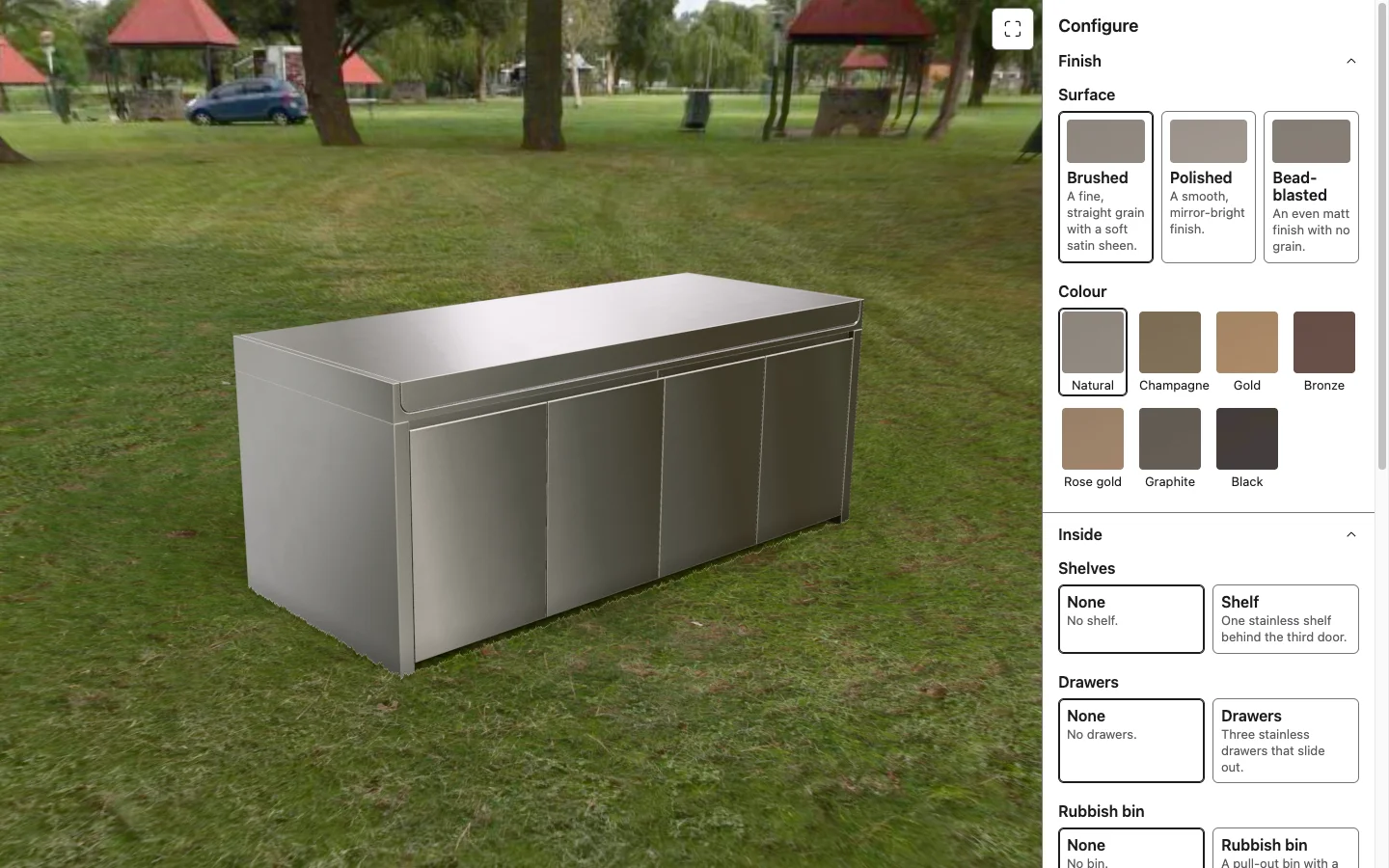 The stainless steel outdoor kitchen in brushed natural finish on a garden lawn, with the configure panel showing surface and colour swatches